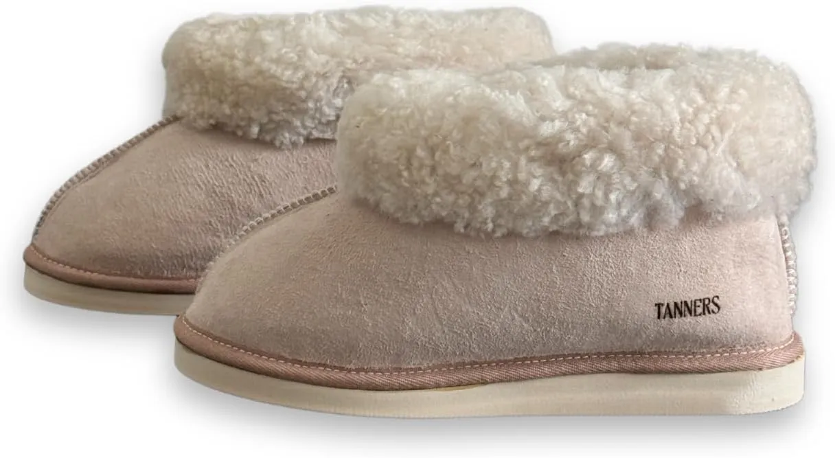 Tanners Men Bootie Slipper with turndown cuff. 100% Shearling Sheepskin. Indoor comfort and softness. Weatherproof non-slip soft sole. Handmade with care, cradling your feet for the utmost coziness.