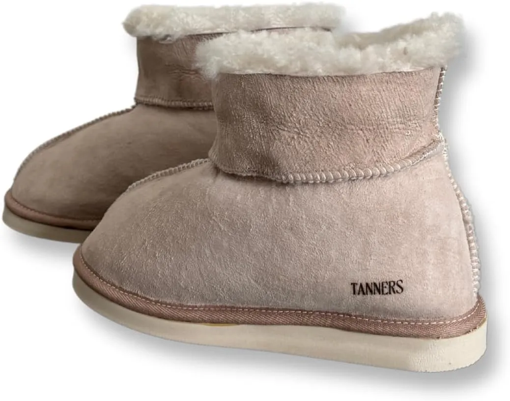 Tanners Men Bootie Slipper with turndown cuff. 100% Shearling Sheepskin. Indoor comfort and softness. Weatherproof non-slip soft sole. Handmade with care, cradling your feet for the utmost coziness.